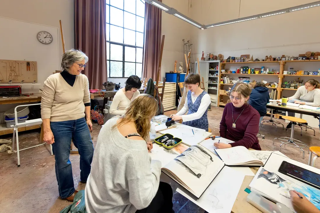 Students working in an art classroom.